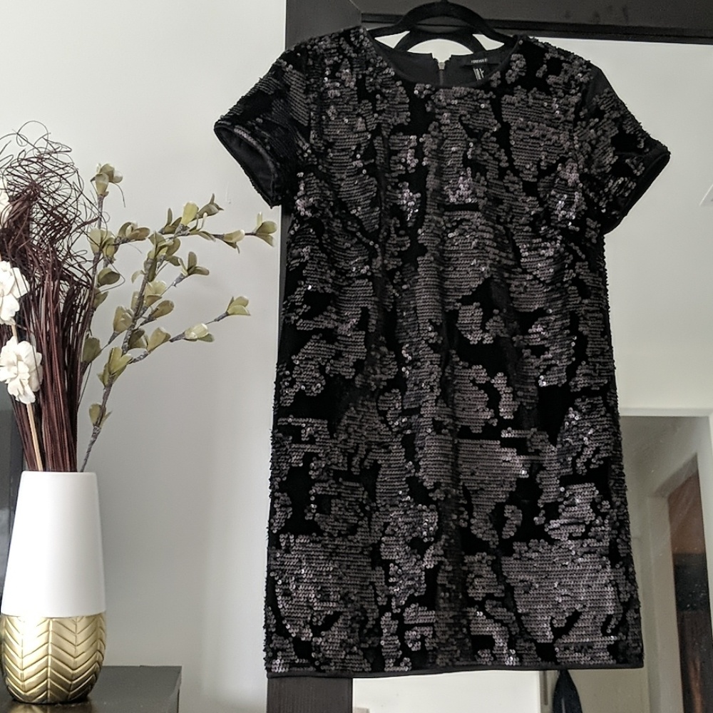 Black velvet dress with matte sequins